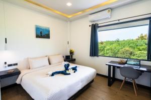 Postel nebo postele na pokoji v ubytování Villa Lila