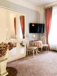 TV a/nebo společenská místnost v ubytování Hotel Trumf