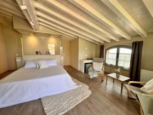Postel nebo postele na pokoji v ubytování Agriturismo Cascina Carai