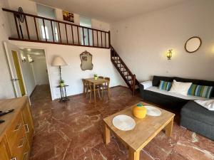 A seating area at Impresionantes vistas del mar en Roses, Canyelles AV-37