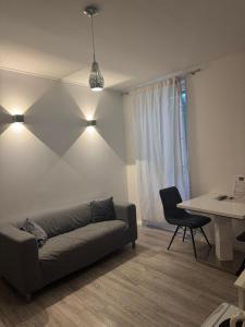 a living room with a couch and a table at Julija Palace in Split