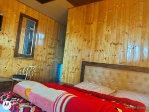 Postel nebo postele na pokoji v ubytování Jbk new hotel Auli