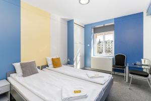 Postel nebo postele na pokoji v ubytování Elemels Planet