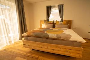 Postel nebo postele na pokoji v ubytování Bergzauber Appartements