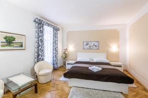 Voodi või voodid majutusasutuse Hotel Trumf toas