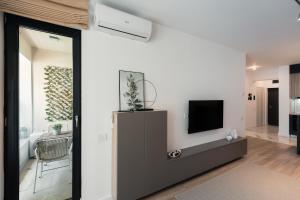 Et tv og/eller underholdning på High-End 1BR in Pipera w Parking