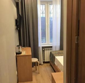 TV a/nebo společenská místnost v ubytování Downtown Old Tbilisi