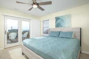 Letto o letti in una camera di Azure home