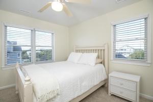 Letto o letti in una camera di Azure home