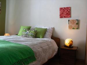Кровать или кровати в номере Apartamento Silveira