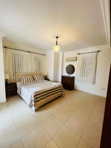 a bedroom with a large bed in a room at Monix Homes-Villa Magic Garden in Kaş