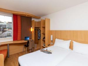 Postel nebo postele na pokoji v ubytování ibis Le Puy-en-Velay Centre + 37 fotografií