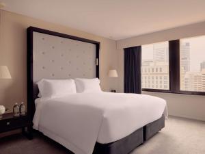 Voodi või voodid majutusasutuse Sofitel Brisbane Central toas