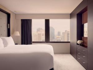 Voodi või voodid majutusasutuse Sofitel Brisbane Central toas