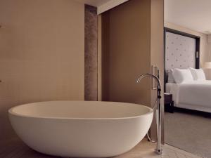 Voodi või voodid majutusasutuse Sofitel Brisbane Central toas