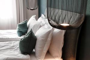 Andermatt Arve Relax by Quokka 360客房内的一张或多张床位