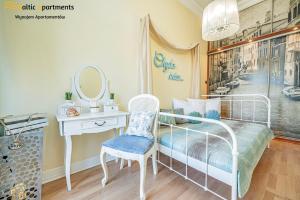 Postel nebo postele na pokoji v ubytování Baltic Apartments - Willa Carmen