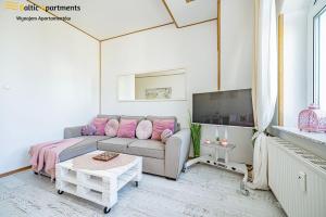TV a/nebo společenská místnost v ubytování Baltic Apartments - Willa Carmen