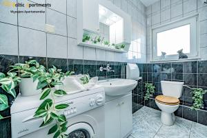 Koupelna v ubytování Baltic Apartments - Willa Carmen