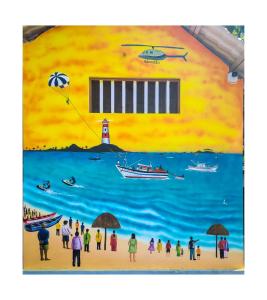 a painting of people on a beach with a lighthouse at Avatar Sea Beach Homestay in Malpe