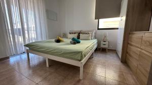 Postel nebo postele na pokoji v ubytování Gouris Appartements