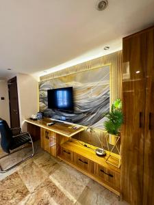Telewizja i/lub zestaw kina domowego w obiekcie Golden Tulip Hotel Port Harcourt -GTPH