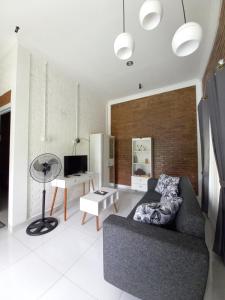 Χώρος καθιστικού στο Guest House B