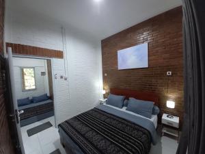 Ένα ή περισσότερα κρεβάτια σε δωμάτιο στο Guest House B +18 φωτογραφίες