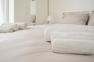 Ένα ή περισσότερα κρεβάτια σε δωμάτιο στο Marina Apartments 1 +15 φωτογραφίες