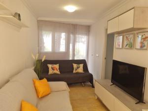 Posedenie v ubytovaní Apartamento Puig Campana