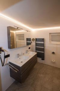 Koupelna v ubytování Landhaus Elto + 24 fotografií