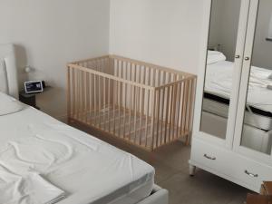 Postel nebo postele na pokoji v ubytování Ruffoli-Home a 300 m dal mare