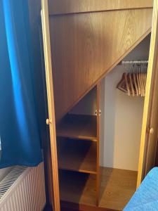 Palanda nebo palandy na pokoji v ubytování Pension Richter