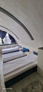 Hotel Jolie Apartments 객실 침대