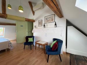 Χώρος καθιστικού στο Doubs Séjour - Chambres climatisées Petits déj en supplément +39 φωτογραφίες