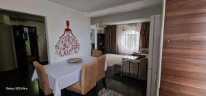 Hotel Jolie Apartments 객실 침대