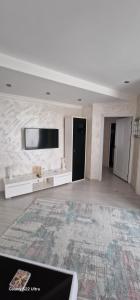 Hotel Jolie Apartments TV 또는 엔터테인먼트 센터
