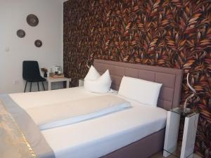 Ένα ή περισσότερα κρεβάτια σε δωμάτιο στο Hotel Schloßschenke