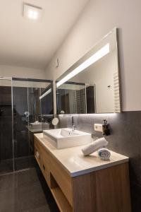 Ein Badezimmer in der Unterkunft Der Unterwirt Guesthouse and Restaurant