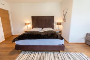 Ein Bett oder Betten in einem Zimmer der Unterkunft Der Unterwirt Guesthouse and Restaurant