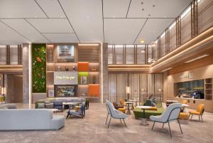 Posezení v ubytování Home2 Suite by Hilton Fuyang Taihe