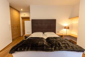 Ein Bett oder Betten in einem Zimmer der Unterkunft Der Unterwirt Guesthouse and Restaurant