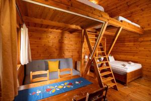 Postel nebo postele na pokoji v ubytování Szilvásvárad Camping & Apartman