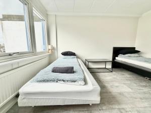 Postel nebo postele na pokoji v ubytování Workershouse 8 Beds + 37 fotografií