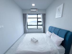 コタキナバルにある适合全家入住 Jesselton Quay高楼层日落景公寓 近Suria & Gaya街 Perfect for Families High-Floor Sunset Condo at Jesselton Quay Near Suria and Gaya Streetのギャラリーの写真