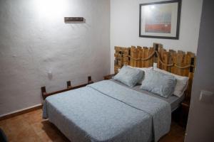 Ένα ή περισσότερα κρεβάτια σε δωμάτιο στο Casa Cueva Los Mansos +40 φωτογραφίες