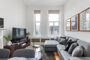 Televisyen dan/atau pusat hiburan di Acton Central Apartment +12 gambar
