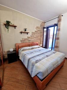 Katil atau katil-katil dalam bilik di 7 min Airport, 15 min Fiera di Roma, WiFi, Garden, 2 TV HD