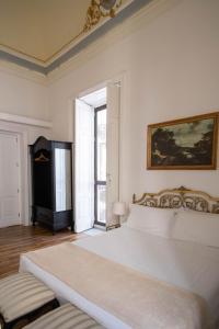 Posteľ alebo postele v izbe v ubytovaní Beretti Home