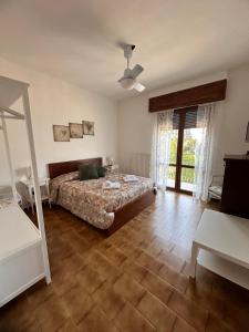 A bed or beds in a room at Little house Lezzeno